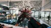 A violent scene from a video game, showing a character being dismembered and glass shattering. Produktbild-Vorschau
