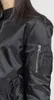 Close-up of a person wearing a black bomber jacket. Produktbild-Vorschau