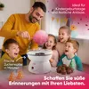 A father is making cotton candy for his children at a party. Podgląd zdjęcia produktu