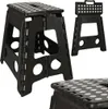 A black folding stool with white polka dots is shown from multiple angles against a white background. Náhled obrázku produktu