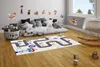 A child's bedroom with a rug and toys. Anteprima dell’immagine prodotto