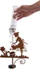 A hand is pouring water into a rain gauge that is part of a decorative garden stake. Anteprima dell’immagine prodotto
