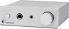 A silver headphone amplifier on a light gray background. Produktbild-Vorschau
