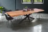 A dining table set in a modern dining room. Produktbild-Vorschau
