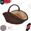 A woven basket with a burlap lining, presented against a blueprint-style background of a house. Voir les images du produit