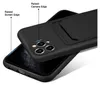 A black phone case with a card slot is shown on top of a smartphone. Podgląd zdjęcia produktu