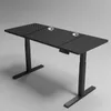 A black, height-adjustable desk with a textured surface and two cable management holes. Podgląd zdjęcia produktu