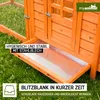 Close-up of a wooden chicken coop with a pull-out tray, set on grass. Produktbild-Vorschau