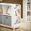 A children's bookshelf with toys and books. Podgląd zdjęcia produktu