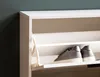 A close-up view of a white shoe cabinet with two gray shoes on one of its shelves. Produktbild-Vorschau