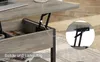 Close-up of a lift-top coffee table mechanism and storage compartment. Produktbild-Vorschau