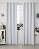 A room interior with two white curtains hanging over a window. Produktbild-Vorschau