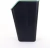 A side view of a black trash can with a green lid, isolated on a white background. Produktbild-Vorschau