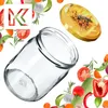 A collage of a glass jar surrounded by various fresh vegetables and a decorative element with a bee. Voir les images du produit
