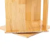 The image shows the bottom part of a wooden, multi-tiered shelf unit, likely a bookshelf or display stand, against a white background. Podgląd zdjęcia produktu