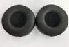 Two black headphone ear pads are shown on a white background. Náhľad obrázku produktu
