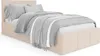 A bed with bedding and a throw blanket, shown from a diagonal angle against a white background. Náhled obrázku produktu