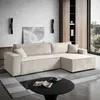 A modern living room with a sectional sofa, coffee table, and artwork. Produktbild-Vorschau