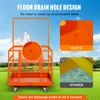 An orange safety cage with a wire mesh top sits on a grassy field under a blue sky. Insets show close-ups of drainage holes. Produktbild-Vorschau