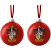 Two red Christmas ornaments with the Gryffindor crest from Harry Potter are displayed against a white background. Produktbild-Vorschau