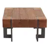 A square wooden coffee table with dark metal legs, shown from a front-facing angle against a white background. Voir les images du produit