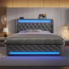 A modern upholstered bed with integrated LED lighting. Produktbild-Vorschau