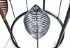 Close-up of decorative metal leaves on a stand. Produktbild-Vorschau