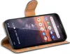 A Nokia 3.2 phone in a brown flip case. Náhled obrázku produktu