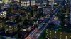 A nighttime view of a simulated city with illuminated buildings and streets. Produktbild-Vorschau