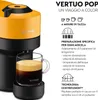 A close-up view of a yellow and black Nespresso Vertuo Pop coffee machine with a glass mug of espresso on a black stand. Produktbild-Vorschau