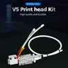 A 3D printer hotend kit is displayed against a dark, abstract background with blue lighting effects. Náhled obrázku produktu
