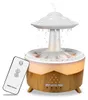 A humidifier with a UFO-shaped top and a wood-grain base, with a remote control next to it. Produktbild-Vorschau