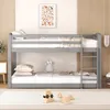 A gray bunk bed with white bedding and pillows, set in a child's room with a colorful alphabet poster on the wall. Produktbild-Vorschau