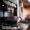 Coffee being brewed into a cup from a coffee machine. Produktbild-Vorschau