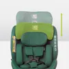 A close-up of a green car seat, highlighting its adjustable headrest. Náhľad obrázku produktu
