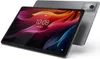 A tablet is shown from a slightly elevated diagonal angle, with its screen displaying a colorful abstract wallpaper and the time. Anteprima dell’immagine prodotto