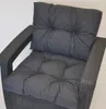 A close-up view of a dark gray cushion set for outdoor furniture. Produktbild-Vorschau