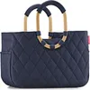 A navy blue quilted shopper bag with gold handles and navy blue fabric grips. Anteprima dell’immagine prodotto
