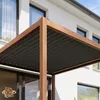A modern house with a wooden-look pergola attached to the side. Náhled obrázku produktu
