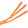 Three orange twisted strands of what appears to be trimmer line or licorice, isolated on a white background. Produktbild-Vorschau