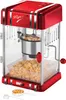 A red retro popcorn maker with popcorn inside. Náhled obrázku produktu