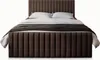 A brown upholstered bed with white pillows and a dark throw blanket, presented on a white background. Produktbild-Vorschau