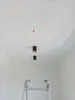 Three ceiling lights are installed on a white ceiling, with a ladder visible at the bottom of the image. Náhľad obrázku produktu