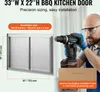 A man is installing a stainless steel BBQ kitchen door with a drill. Náhled obrázku produktu