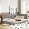 A modern bedroom with a grey upholstered daybed, a large abstract artwork on the wall, and a window with curtains. Náhled obrázku produktu