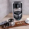 A coffee maker and its accessories are arranged on a wooden surface. Náhled obrázku produktu