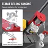 Close-up view of a red and yellow electric hoist, with inset diagrams showing installation and a stop device. Náhľad obrázku produktu