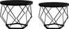 Two black metal side tables with geometric bases and round tops, presented against a white background. Produktbild-Vorschau