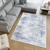 A living room with a sectional sofa and a rug. Produktbild-Vorschau