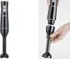 Two views of a black hand blender, one fully assembled, the other showing the detachable blending wand being attached. Náhled obrázku produktu